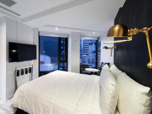 Katil atau katil-katil dalam bilik di Hotel Relax III