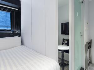 Katil atau katil-katil dalam bilik di Hotel Relax III