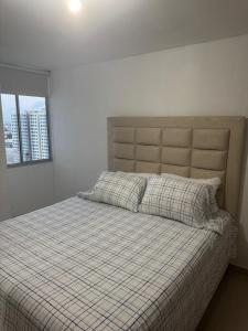 Voodi või voodid majutusasutuse Modern apartment with panoramic views in Boston toas