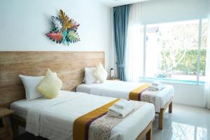 Billede fra billedgalleriet på De palm poolvilla by KC i Ban Chin Tham Mai