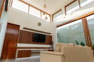 Μια τηλεόραση ή/και κέντρο ψυχαγωγίας στο Aruna Villa Dewi Sri