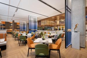 Εστιατόριο ή άλλο μέρος για φαγητό στο Hilton Garden Inn Zhengzhou Xinzheng International Airport