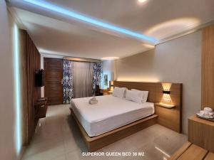 Postel nebo postele na pokoji v ubytování Bali Balitung