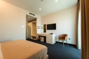 Μια τηλεόραση ή/και κέντρο ψυχαγωγίας στο Hotel Delta Premium