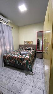 Postel nebo postele na pokoji v ubytování Casa Moderna - Centro