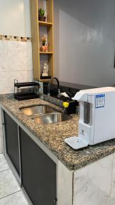 Kuchyň nebo kuchyňský kout v ubytování Casa Moderna - Centro