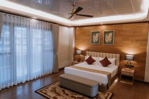 Postel nebo postele na pokoji v ubytování Rosepine Hotel + 37 fotografií