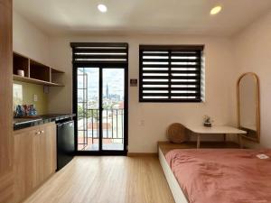 Postel nebo postele na pokoji v ubytování Hạt Nắng Garden - Homestay & Restaurant