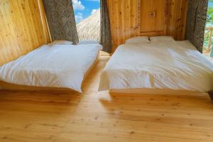 Postel nebo postele na pokoji v ubytování Tả Mẩy Homestay + 51 fotografií