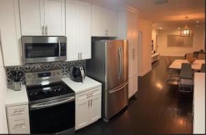 Η κουζίνα ή μικρή κουζίνα στο Booking Open Now For Your Holidays