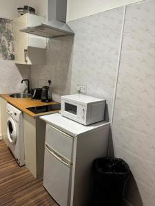O bucătărie sau chicinetă la Arndale Apartments Manchester +10 fotografii