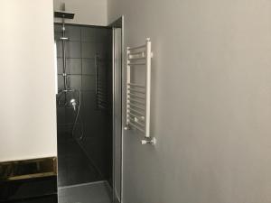 a bathroom with a shower with a glass door at Casa Meri in Montesilvano +16 photos