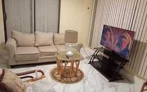 TV a/nebo společenská místnost v ubytování Prada Home Club + 2 fotografie