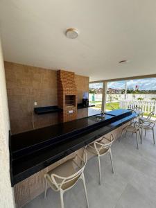 Μπαλκόνι ή βεράντα στο FLAT ACONCHEGANTE poucos min da praia +61 φωτογραφίες