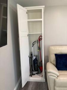 a door into a room with a fire hydrant at Lake Cabin Ideal for Outdoor Adventures in Maine in North Harpswell