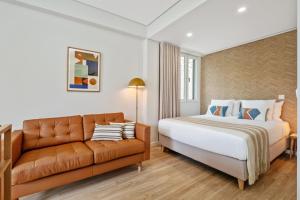 Postel nebo postele na pokoji v ubytování Modern Studio Steps From Beach