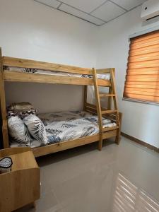 Ένα ή περισσότερα κρεβάτια σε δωμάτιο στο Quiet and Serene Environment at Casa Aemilia