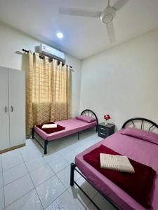 Ένα ή περισσότερα κρεβάτια σε δωμάτιο στο The Cozy Inn