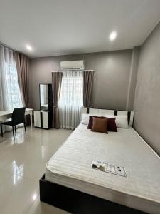 Voodi või voodid majutusasutuse Baan Farm-Suk in Su-ngai Kolok Narathiwat toas