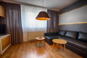 Lounge alebo bar v ubytovaní Apartamenty Ołtaszyńska