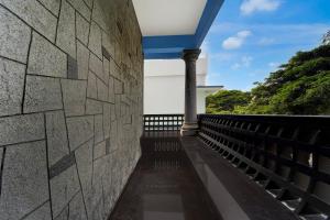 Balkón nebo terasa v ubytování Super Hotel O Kazhakuttam Railway Station Formerly Graceful Stay + 21 fotografií