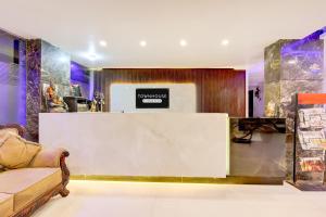 Posezení v ubytování Super Townhouse Oak New Delhi Central Railway Junction Formerly Uppal International