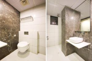 Koupelna v ubytování Super Townhouse Oak New Delhi Central Railway Junction Formerly Uppal International