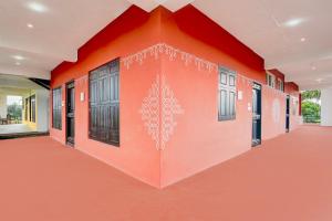 Fotografie z fotogalerie ubytování Super Collection O Isha Yoga Center Coimbatore Formerly Nischala Stay v destinaci Alāndurai