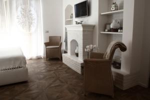 TV a/nebo společenská místnost v ubytování Casa Fioravanti