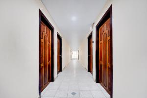 Fotografie z fotogalerie ubytování Super Hotel O Pathanamthitta Near Mahatma Gandhi Statue v destinaci Pathanāmthitta