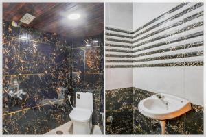 Koupelna v ubytování Hotel O Russel Chowk Formerly VN Residency Jabalpur