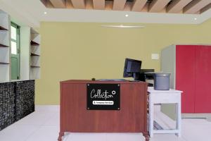 a counter with a sign on it in a room at Super Collection O Chalakkudy River Annamanada Formerly Svasthya Retreat in Māla