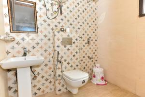 Koupelna v ubytování Hotel Shivaye Residency