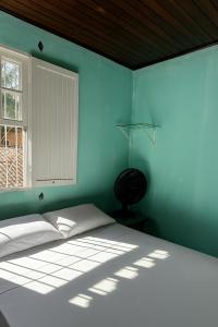 Ένα ή περισσότερα κρεβάτια σε δωμάτιο στο Bela Vista Home