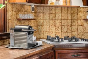 Köök või kööginurk majutusasutuses Lush Garden Oasis by Sea N' Rent +33 fotot