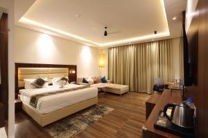 Postel nebo postele na pokoji v ubytování Enrise By Sayaji, Kalaburagi + 50 fotografií