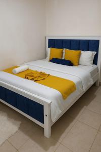 Ένα ή περισσότερα κρεβάτια σε δωμάτιο στο preene comfort