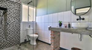 Et badeværelse på Remhoogte Farmstay + 33 billeder