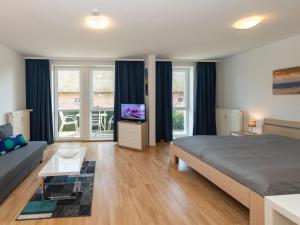 Ένα ή περισσότερα κρεβάτια σε δωμάτιο στο Höftresidenz Alt Reddevitz - Wohnung 14