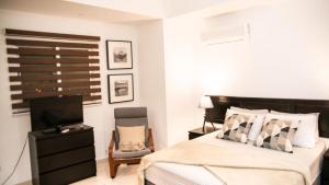 Postel nebo postele na pokoji v ubytování Eclectic 3 levels and 5 bedrooms penthouse