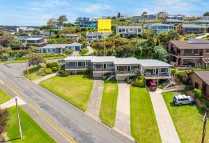 an aerial view of a house with a street at Lovely Unit with Glorious Sea Views in McCracken