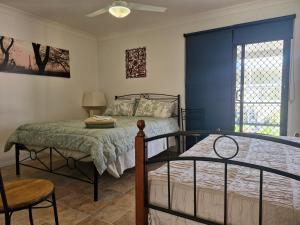 Postel nebo postele na pokoji v ubytování Beulah Retreat + 4 fotografie