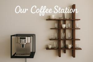 a coffee station with a coffee machine on a wall at castle palace kandy in Kandy +42 photos