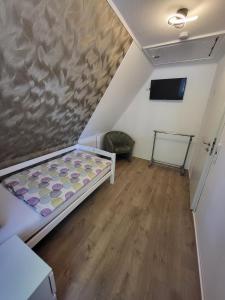 Φωτογραφία από το άλμπουμ του Gemütliche Wohnung mit großer Dachterrasse σε Röhrsen