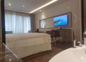 Postel nebo postele na pokoji v ubytování Xenious Opulent Hamirpur