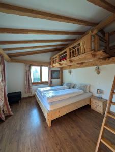 Postel nebo postele na pokoji v ubytování Appt de charme dans chalet - liberté & nature