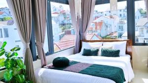 Postel nebo postele na pokoji v ubytování Lantana Homestay + 58 fotografií