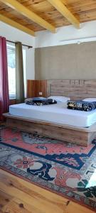 Voodi või voodid majutusasutuse Juniper Home Kaza by Mountain Bee toas