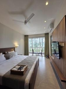 Postel nebo postele na pokoji v ubytování Cloud Green Resort