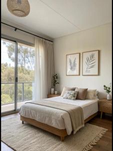 Ένα ή περισσότερα κρεβάτια σε δωμάτιο στο The Eden of Paradise